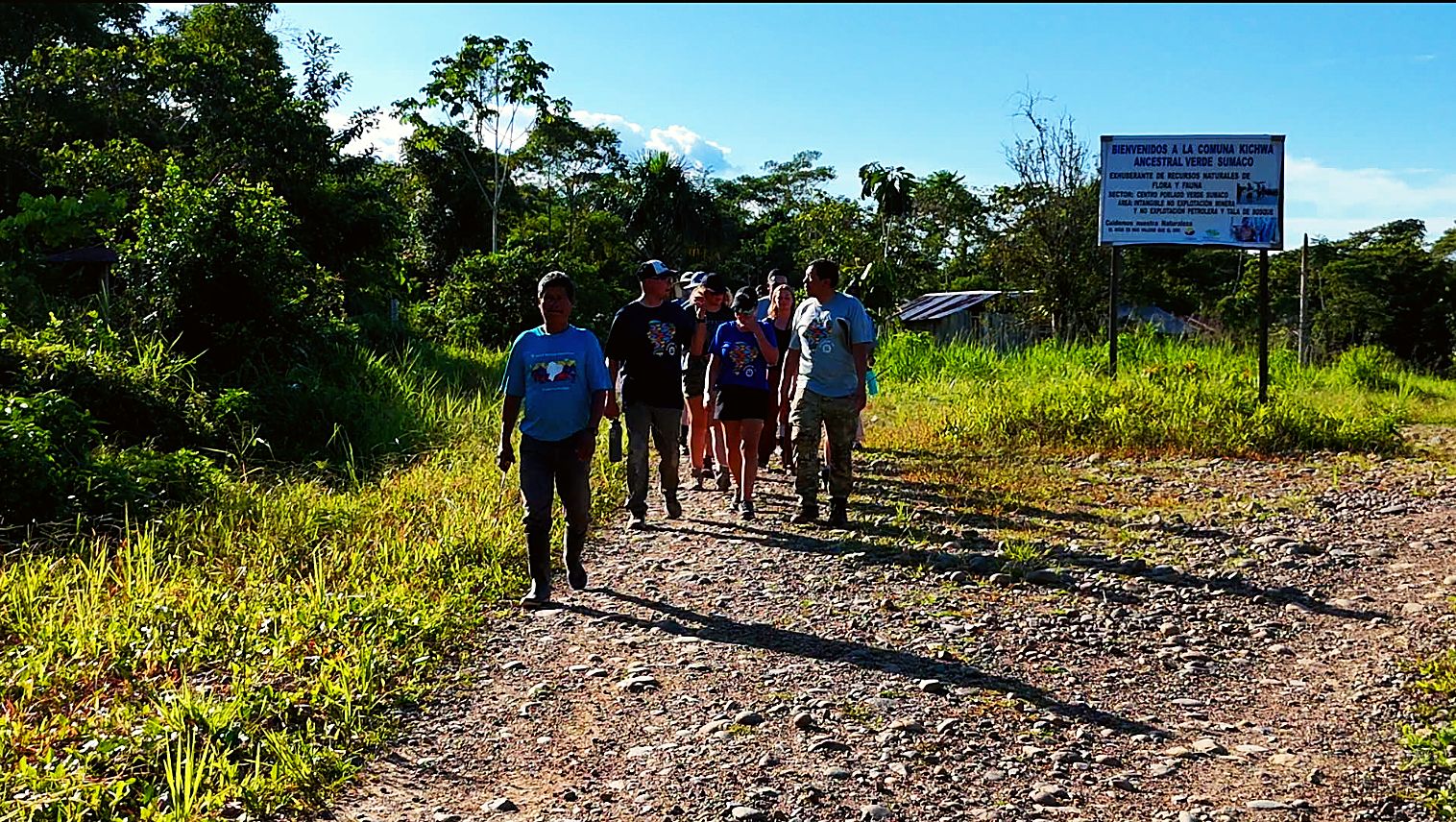 volunteers walking through Verde Sumaco to the job sites